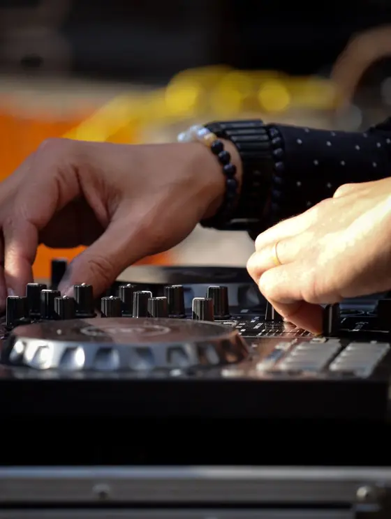 DJ operating professional event equipment